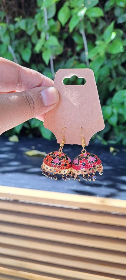 Handmade traditional jhumka earrings in gold and black by Hoops and Clay